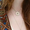 The Wheel Pendant on neck
